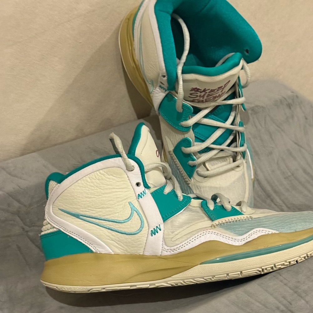 Nike White and Green Athletic Shoes with High-Top Design